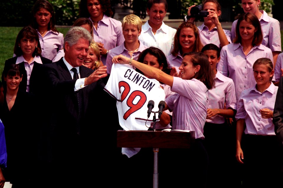 The U. S. A. Women's Soccer Team presents President Bill Clinton a CLINTON 99 soccer shirt
