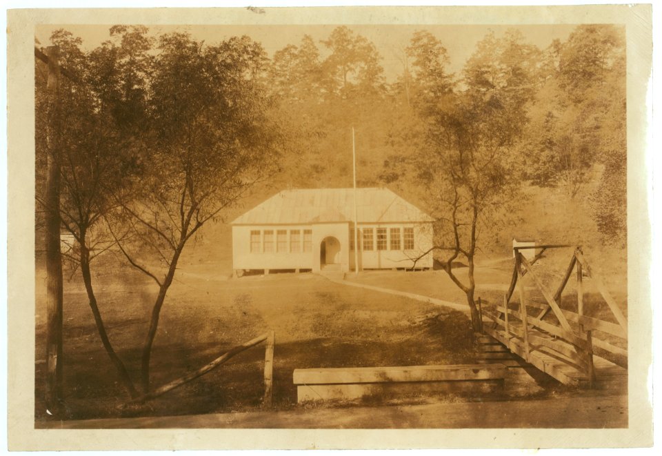 The United Consolidated School near Charleston, W. Va. Also note photo of The Tate School, one of the two schools that were abandoned to make this. LOC nclc.04369