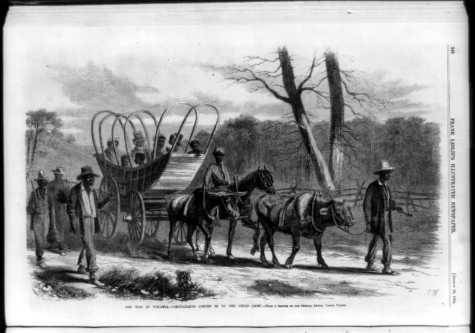 The war in Virginia - contrabands coming in to the Union camp (Blacks in wagon and walking) LCCN99614127