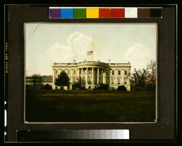 The White House, Washington, D.C., south facade, with large conservatory wing at left and American flag flying above LCCN2003668184
