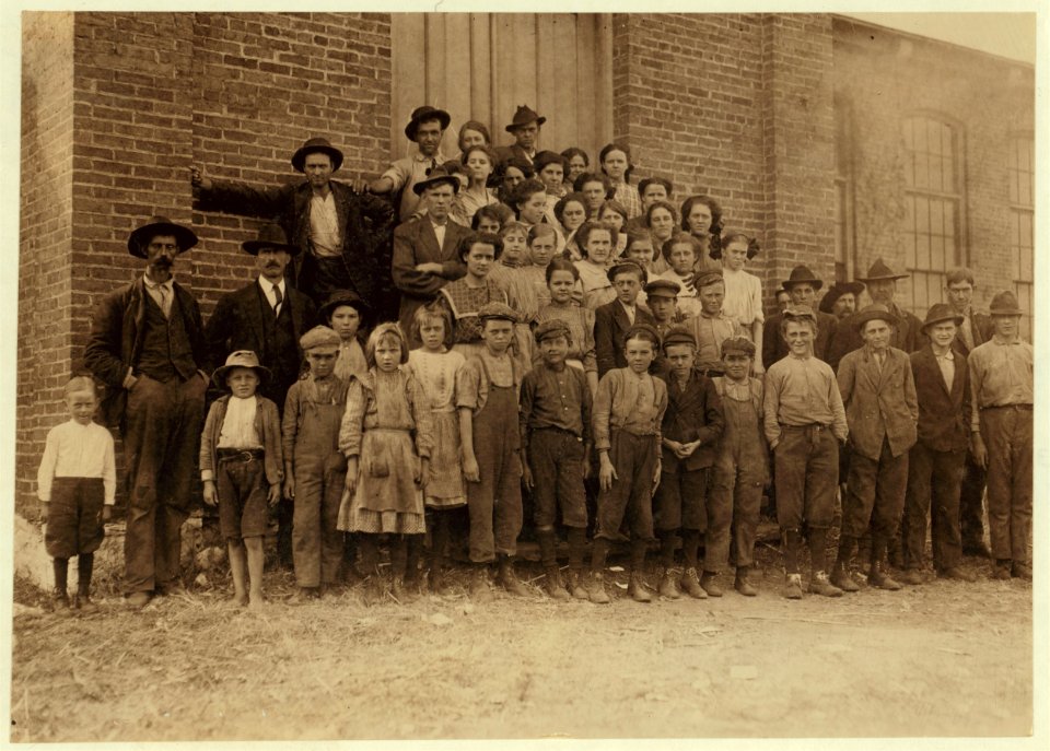 The whole force in Elk Cotton Mills. Tiny boy in white waist on extreme left, 'Just helps his mother,' the superintendent said. Next boy is Leo, with a 'steady job,' see photo 1753. LOC nclc.01900