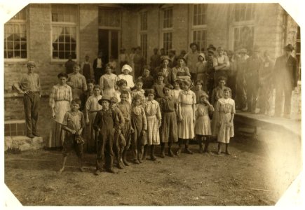 The whole force of workers in the cotton mills of Stevenson, Ala. Several of them are apparently under twelve, but I could not get the ages. Photo posed by the general manager. LOC nclc.02889
