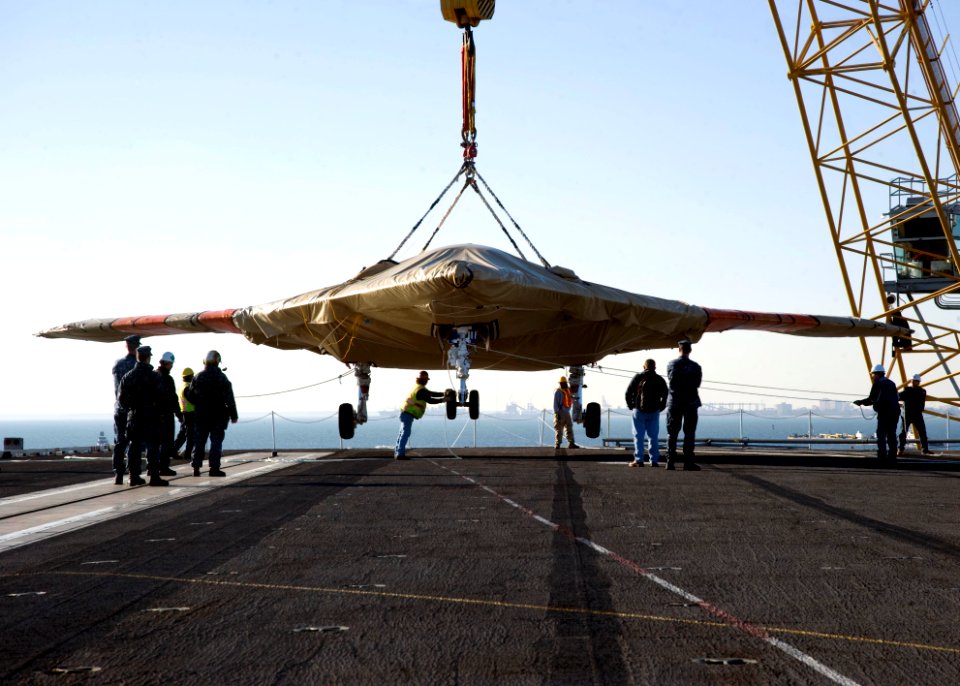 The X-47B Unmanned Combat Air System demonstrator is loaded onto USS Harry S. Truman. (8224463434)
