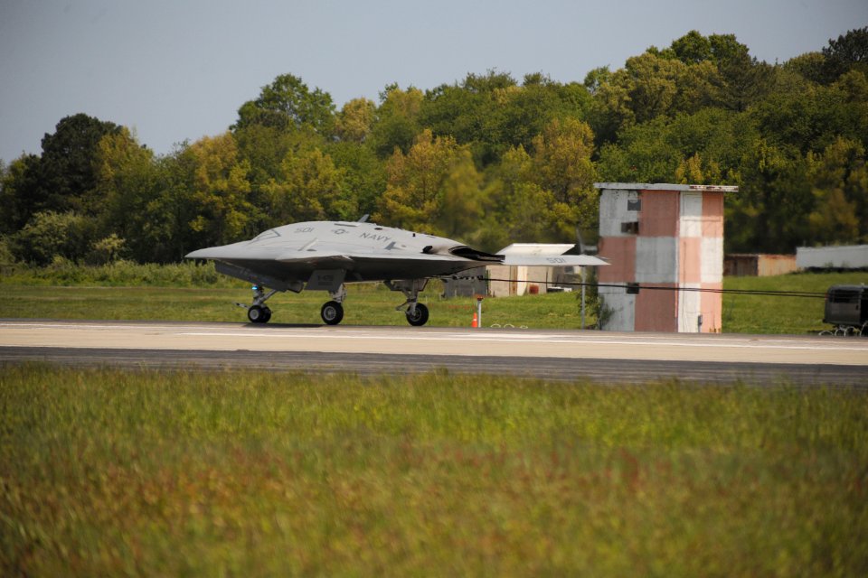The X-47B conducts its first arrested landing. (8718545772)