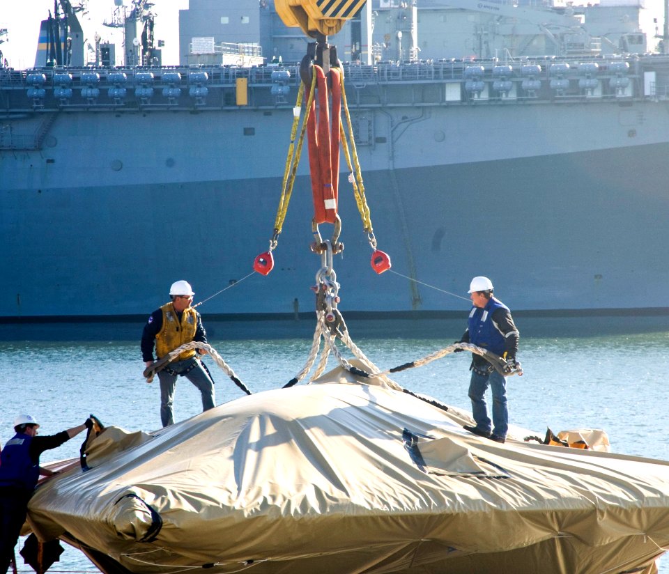 The X-47B Unmanned Combat Air System demonstrator is loaded onto USS Harry S. Truman. (8224464250)