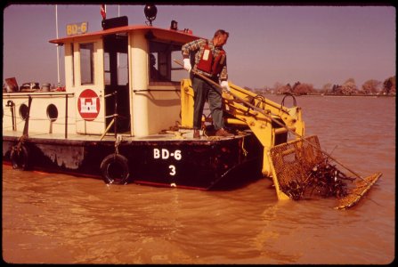 The-job-of-clearing-drift-from-the-potomac-and-anacostia-rivers-is-done-by-the-army-corps-of-engineers-april-1973 7461390294 o