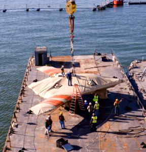 The X-47B Unmanned Combat Air System demonstrator is loaded onto USS Harry S. Truman. (8224463910)