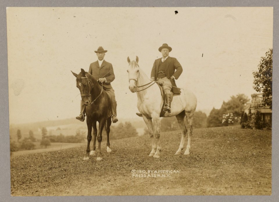 Theodore Roosevelt and his brother in law, Douglas Robinson, on horse back LCCN2013651280