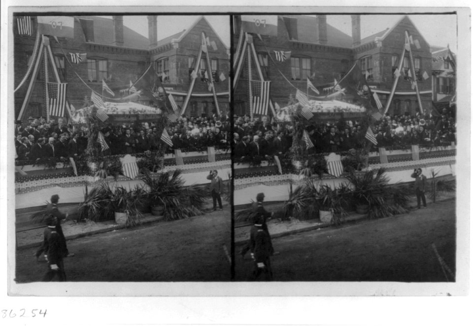 Theodore Roosevelt and crowd on decorated rostrum LCCN2002706545