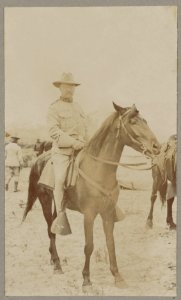 Theodore Roosevelt in Rough Riders uniform sitting on horseback) - James Burton, camera artist, N.Y LCCN2012646962