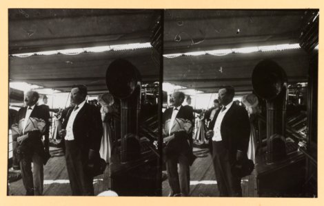 Theodore Roosevelt on deck of ship with another man, facing left LCCN2013650586