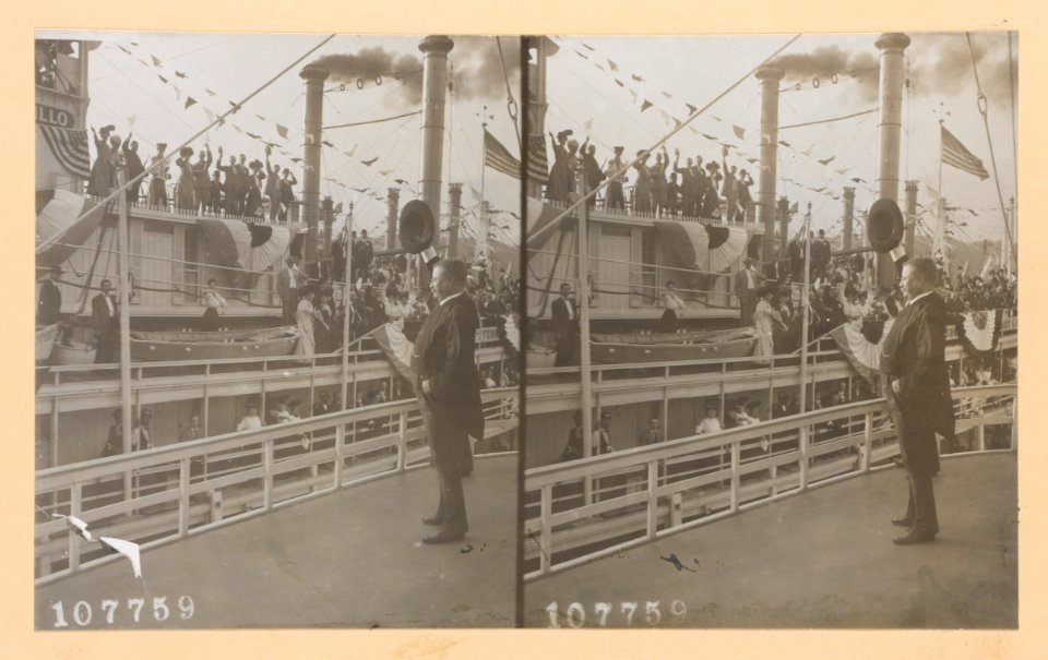 Theodore Roosevelt on deck of ship waving with his hat to a cheering crowd aboard another ship LCCN2013650584
