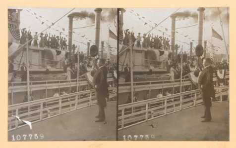 Theodore Roosevelt on deck of ship waving with his hat to a cheering crowd aboard another ship LCCN2013650584