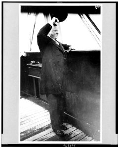 Theodore Roosevelt saluting from bridge of Kaiserin Auguste Victoria, June 20, 1910 LCCN90710707