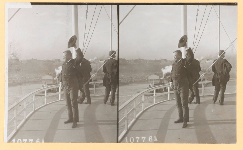 Theodore Roosevelt standing on deck of ship and waving with his hat LCCN2010645469