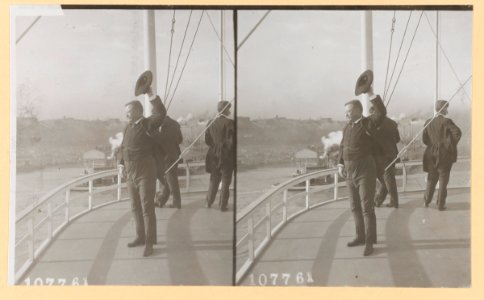 Theodore Roosevelt standing on deck of ship and waving with his hat LCCN2010645469