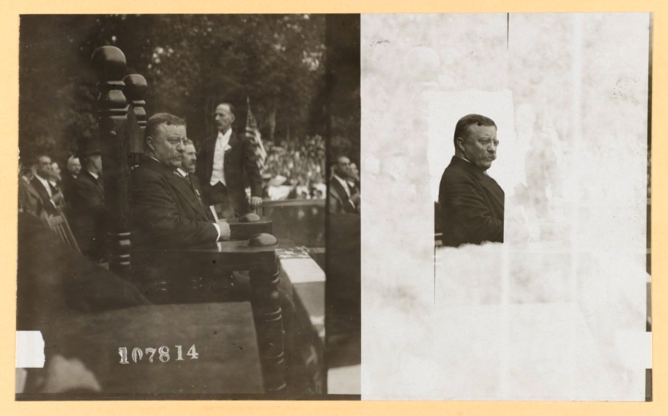 Theodore Roosevelt seated in large wooden chair watching parade LCCN2013649592