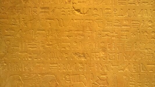Hieroglyphs egyptian temple low relief photo