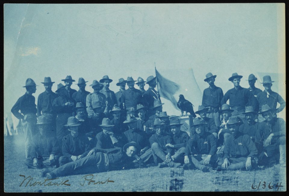 Theodore Roosevelt's Rough Riders, enlisted men and bird mascot, at military camp, Montauk Point, New York LCCN2013651520