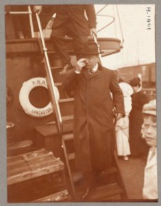 Theodore Roosevelt, full-length portrait, exiting stairs of ship, facing front LCCN2013647431