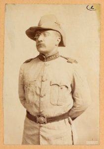 Theodore Roosevelt, three-quarter length portrait, hands behind his back, facing left LCCN2013651052 photo