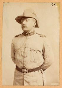 Theodore Roosevelt, three-quarter length portrait, hands behind his back, facing left LCCN2013651052