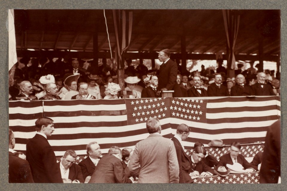 Theodore Roosevelt, turned left, speaking to seated audience at Rochambeau ceremony LCCN2013650567