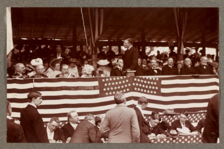 Theodore Roosevelt, turned left, speaking to seated audience at Rochambeau ceremony LCCN2013650567