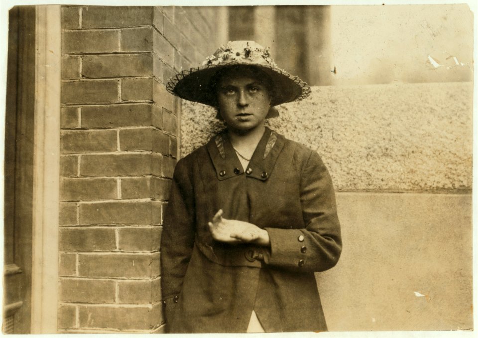 Theresa Quinlan - 14 years old April 14th - Spooler. Hand cut in Iron Works Mill. Was taking loose band off a spooler. Two weeks learning. Is in picture of girls play at King Philip LOC nclc.03093