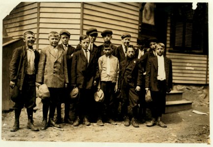 These boys all said they worked in the Everett Mill, another boy told me that the smallest boys do not work. There (sic) names are John Pickacki, 84 Union Street, smallest boy in the picture LOC nclc.02342 photo