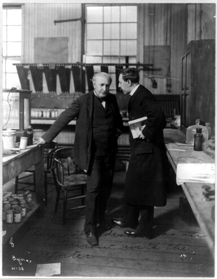 Thomas A. Edison, in lab being interviewed by reporter LCCN2017648508
