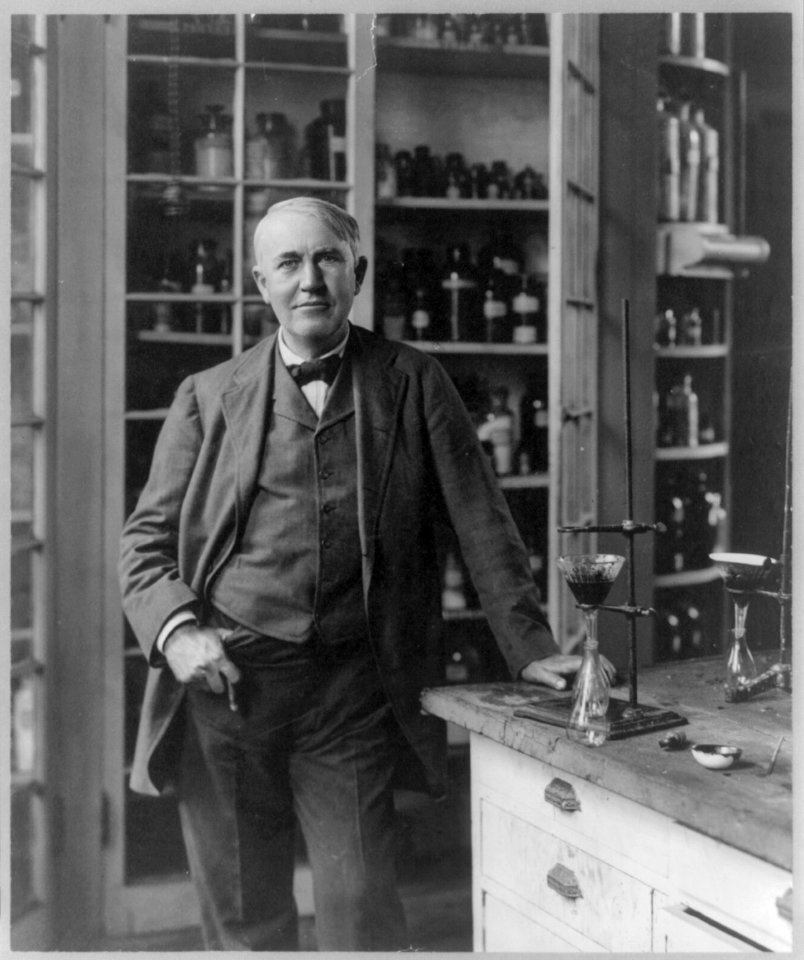 Thomas Alva Edison, 1847-1931, three-quarter length portrait, standing, in laboratory LCCN2005691325