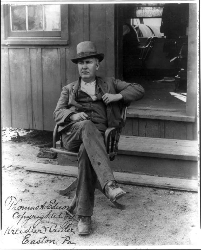 Thomas Alva Edison, 1847-1931, full-length portrait, seated in swivel chair outside office, facing left LCCN2005685547