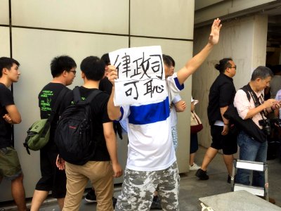 香港上訴庭的對學民思潮前召集人黃之鋒、學聯前秘書長周永康及前常委羅冠聰改判裁定 11