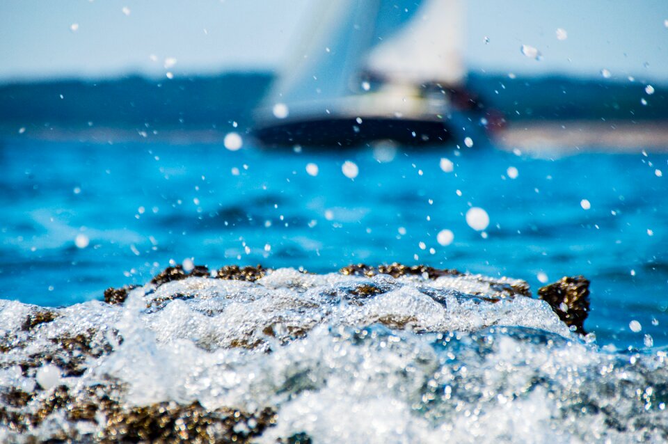 Wave breakwater blue sea