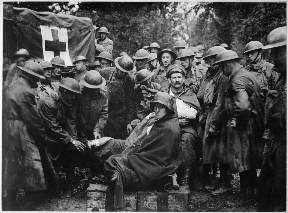 Wounded German prisoners receiving medical attention at first-aid station of 103rd and 104th Ambulance Companies.... - NARA - 530754