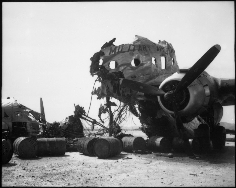 Wreckage of big transport which North Koreans hit while it was on Kimpo Airfield, is again in friendly hands, upon... - NARA - 532401