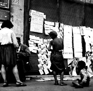 “Children In Naples, Italy”. Boys and newspapers. Photographed by Lieutenant Wayne Miller, July 1944. U.S. Navy Photograph, now in the collections of the National Archives