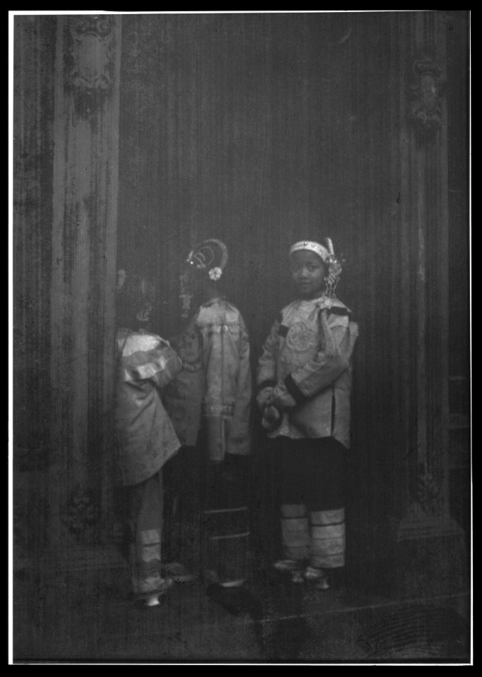 Three girls standing in a doorway, Chinatown, San Francisco LOC agc.7a55072