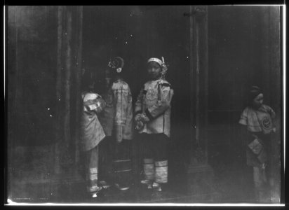 Three girls standing in a doorway, Chinatown, San Francisco LOC agc.7a55094