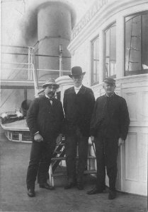 Three crew members on deck of steamship VICTORIAN, Washington, ca 1900 (HESTER 667)