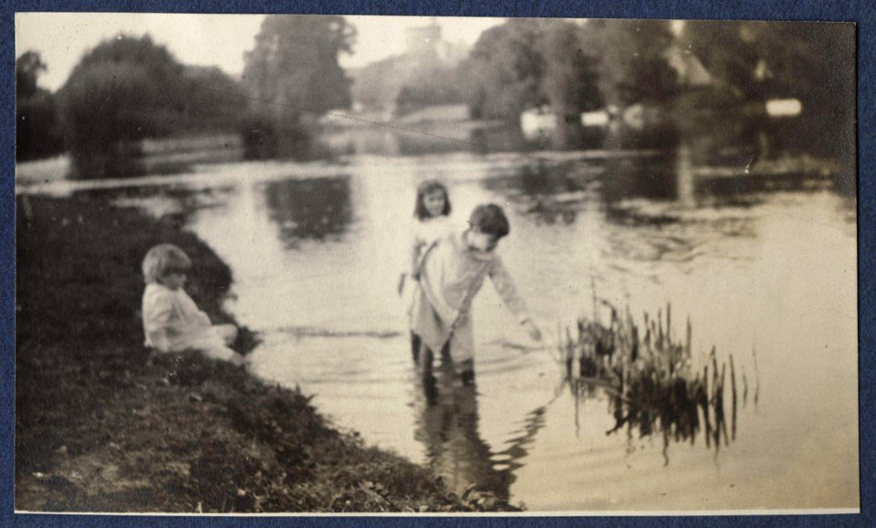 Three unknown children playing in the river Thames by Lady Ottoline Morrell