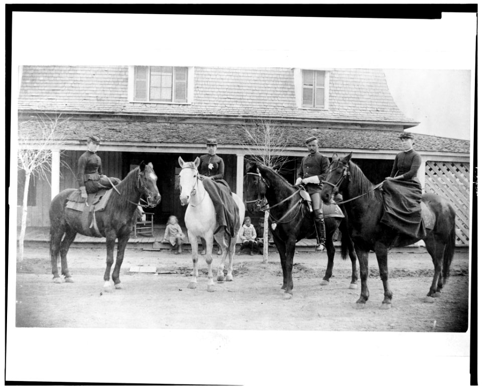 Three women and a man, all in uniform and on horseback, Fort Verde, Arizona LCCN93511949