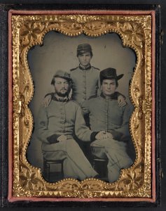 Three unidentified soldiers in Confederate artillerymen uniforms LCCN2012646160
