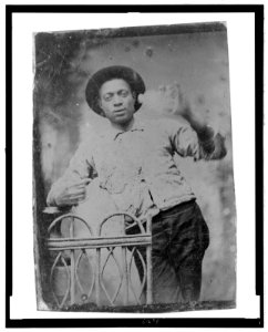 Three-quarter length portrait of African American man, standing LCCN2006688037