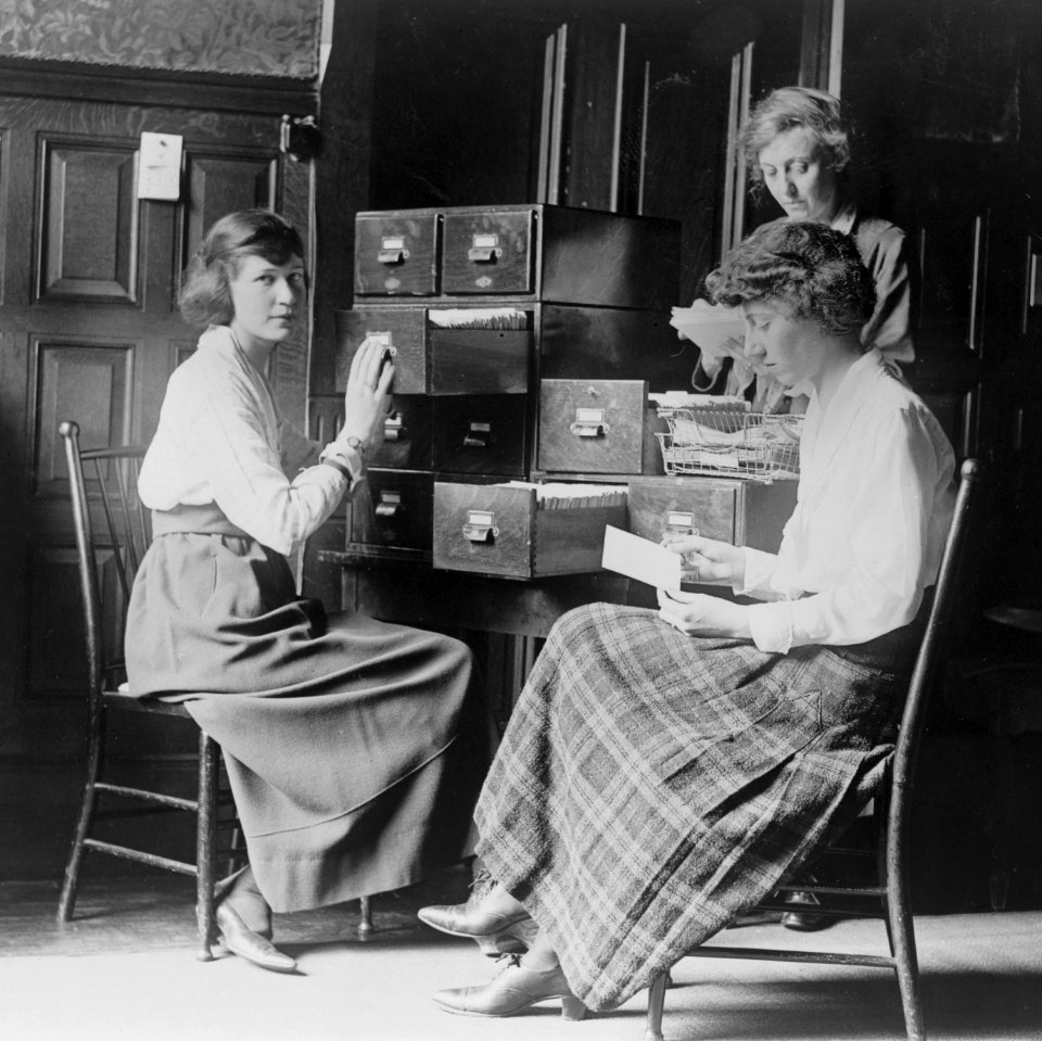 Three women work at the card index files at the headquarters of the National Woman's Party in Washington, D.C. LCCN95502385 (cropped)