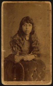 Three-quarter-length portrait of an unidentified woman standing behind a chair) - A. H. Plecker, 902 Main Street, Lynch(burg), Va LCCN2010647807