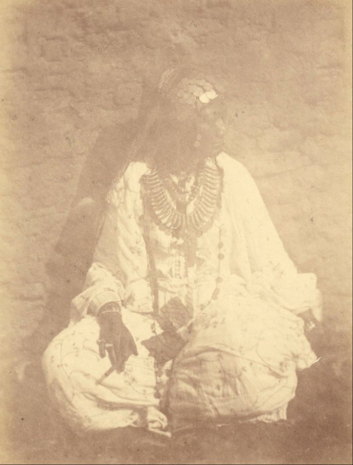 Théodule Devéria (French - (Portrait of a Native Woman Sitting Against a Wall) - Google Art Project