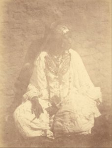 Théodule Devéria (French - (Portrait of a Native Woman Sitting Against a Wall) - Google Art Project