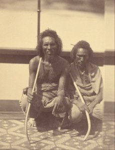 Théodule Devéria (French - (Portrait of Two Native Men Sitting on a Boat Holding Long Curved Sticks) - Google Art Project